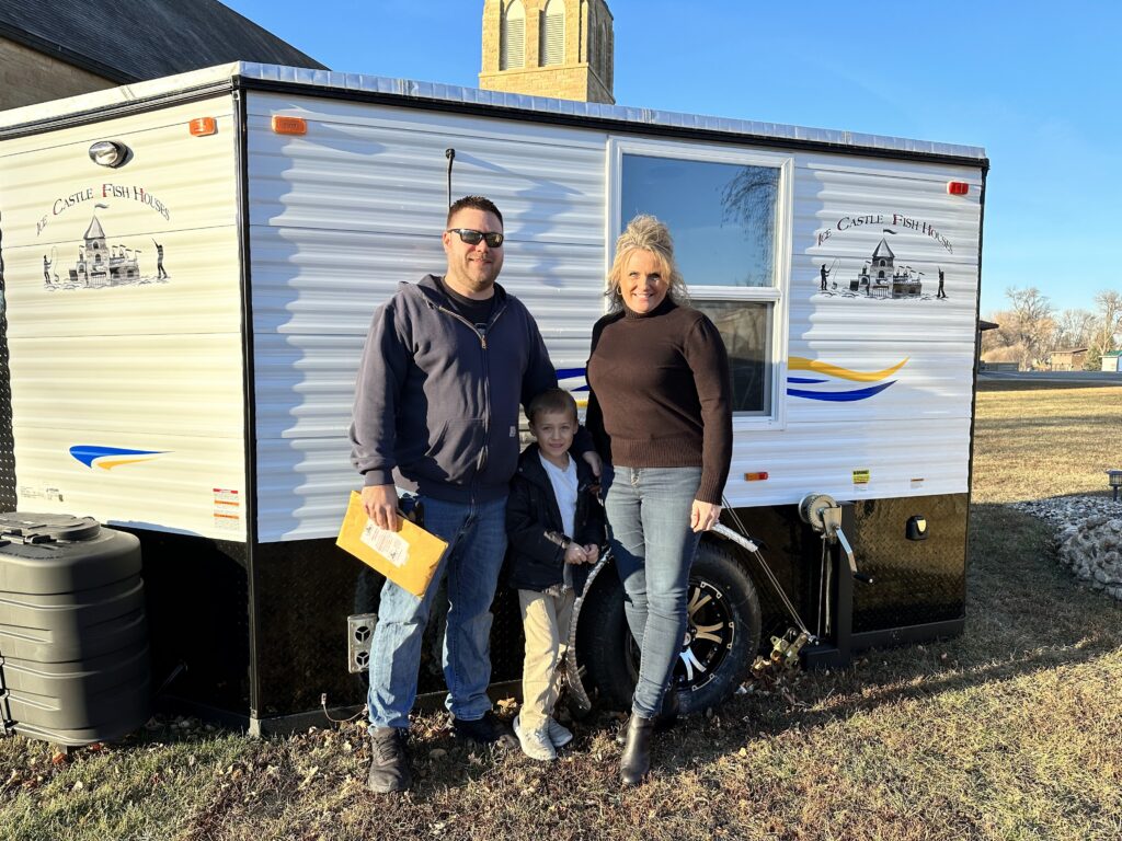 Andrew Mack with his son Mason Mack and Principal Mrs. Sigurdson